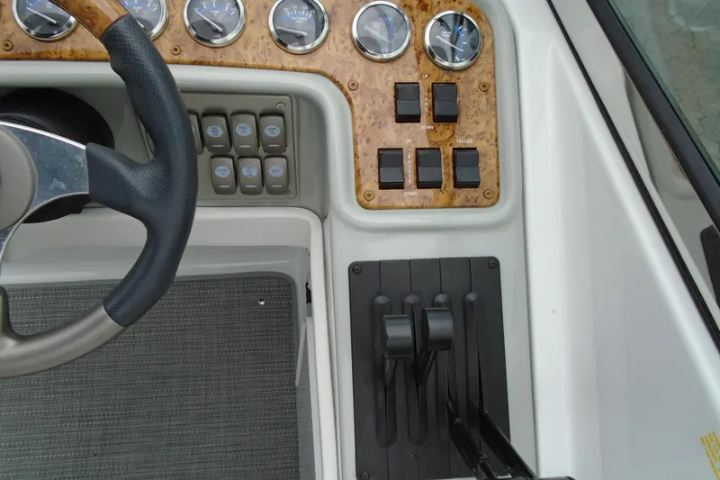 Slide: The Image of Dashboard of a 2007 Formula 280 Bowrider boat with steering wheel and controls. - 11
