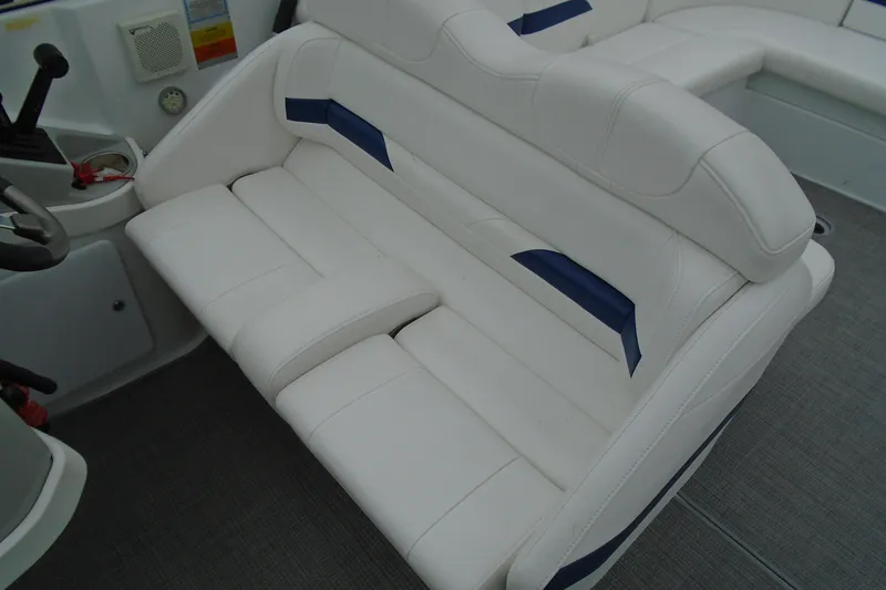 Slide: The Image of 2007 Formula 280 Bowrider interior seating with white and blue upholstery. - 20