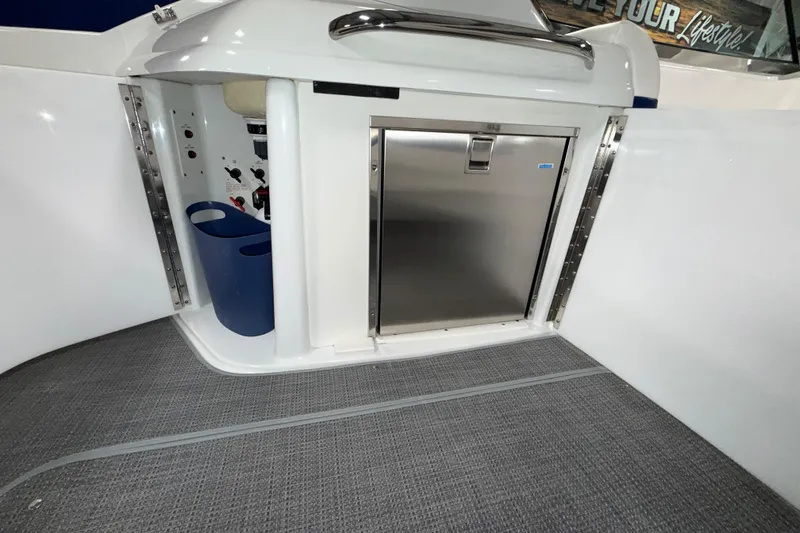 Slide: The Image of 2007 Formula 280 Bowrider interior with stainless steel cabinet and control panel. - 26