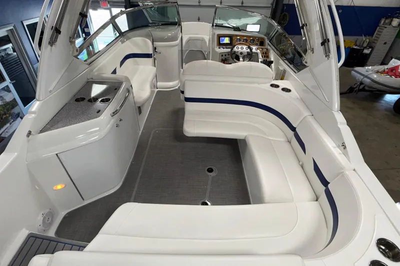 Slide: The Image of 2007 Formula 280 Bowrider interior with white seating and modern dashboard. - 33