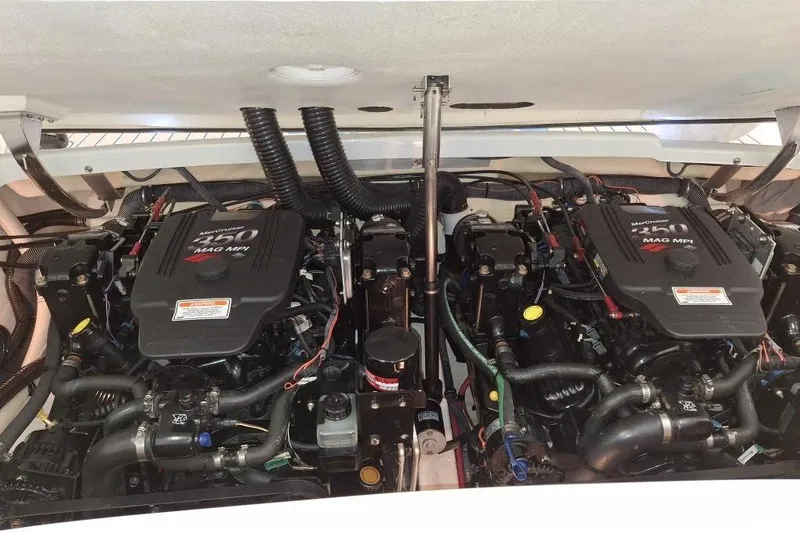 Slide: The Image of Twin MerCruiser engines in a 2007 Formula 280 Bowrider boat engine compartment. - 42