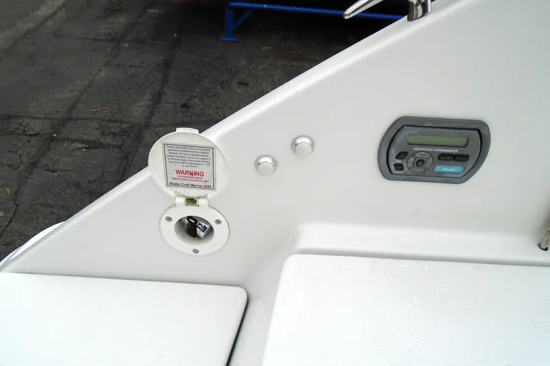 Slide: The Image of 2007 Formula 280 Bowrider dashboard with Kenwood Commander and warning label. - 6