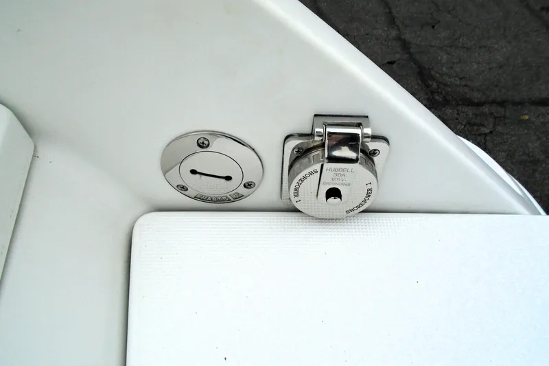 Slide: The Image of 2007 Formula 280 Bowrider waste and power connectors on white surface. - 7