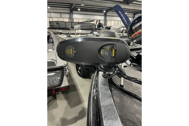 Slide: The Image of 2023 Caymas CX 18 S boat with Minn Kota Ultrex trolling motor in showroom. - 8