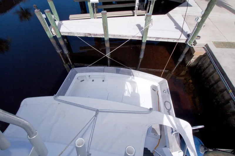 Slide: The Image of Aerial view of 1990 Viking 53 Convertible yacht docked at marina. - 36