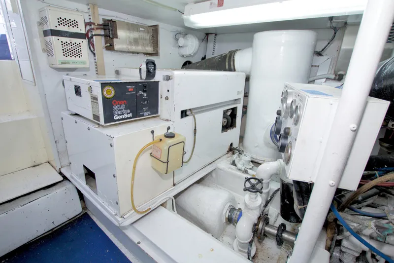 Slide: The Image of Engine room of 1990 Viking 53 Convertible with Onan marine generator. - 79