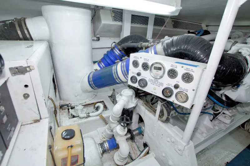 Slide: The Image of Engine room of 1990 Viking 53 Convertible yacht with gauges and pipes. - 82
