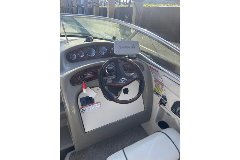 Slide: The Image of Sea Ray 250 Amberjack 2007 helm with Garmin navigation system. - 11