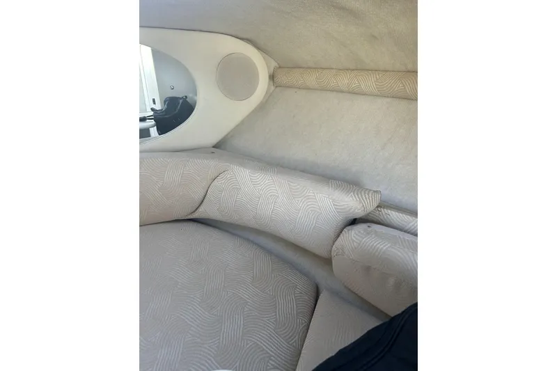 Slide: The Image of Interior of 2007 Sea Ray 250 Amberjack with beige upholstery. - 14