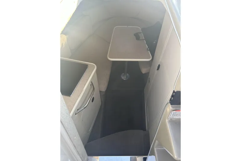 Slide: The Image of Interior of 2007 Sea Ray 250 Amberjack with table and seating area. - 17