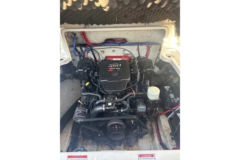 Slide: The Image of Engine compartment of a 2007 Sea Ray 250 Amberjack boat. - 19