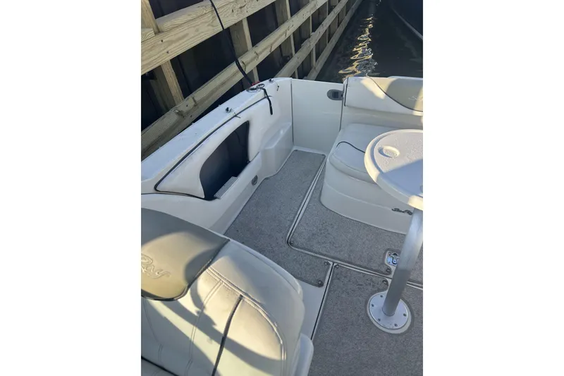 Slide: The Image of Interior of a 2007 Sea Ray 250 Amberjack with seating area. - 7