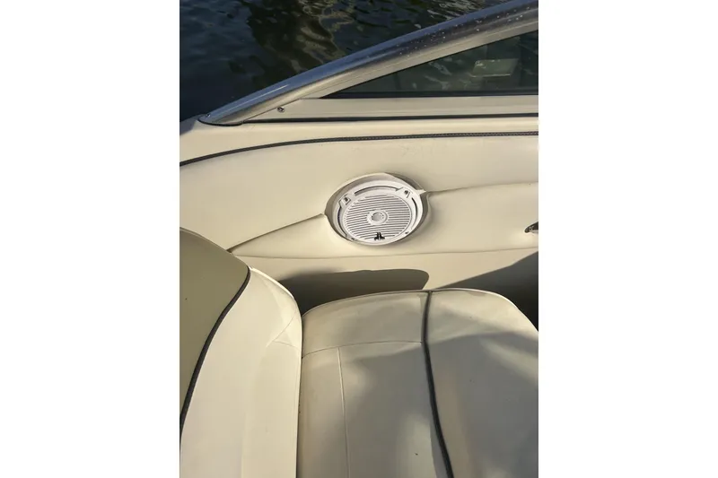 Slide: The Image of Interior of a 2007 Sea Ray 250 Amberjack boat with speaker. - 9