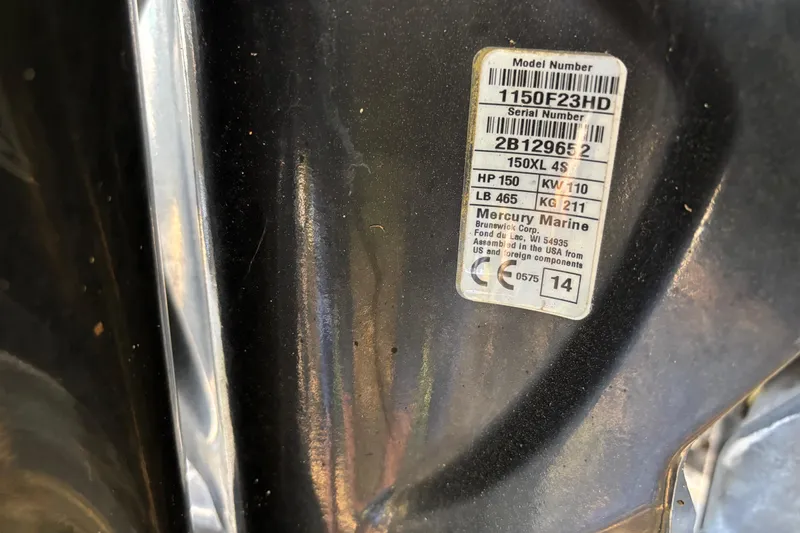 Slide: The Image of Label on a 2015 Boston Whaler 190 Outrage, featuring Mercury Marine specifications. - 16
