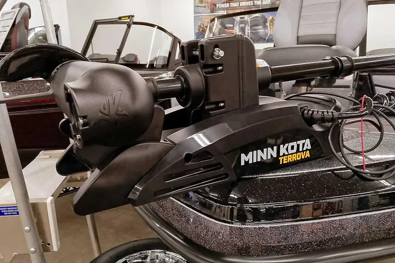 Slide: The Image of 2026 Ranger 1880MS Angler with Minn Kota Terrova trolling motor, close-up view. - 11