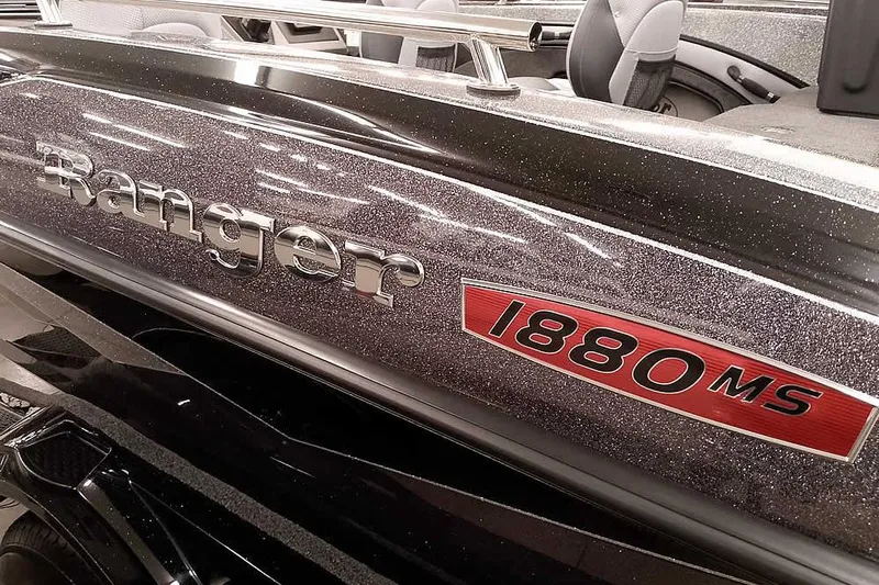 Slide: The Image of 2026 Ranger 1880MS Angler boat with metallic finish and logo detail. - 8