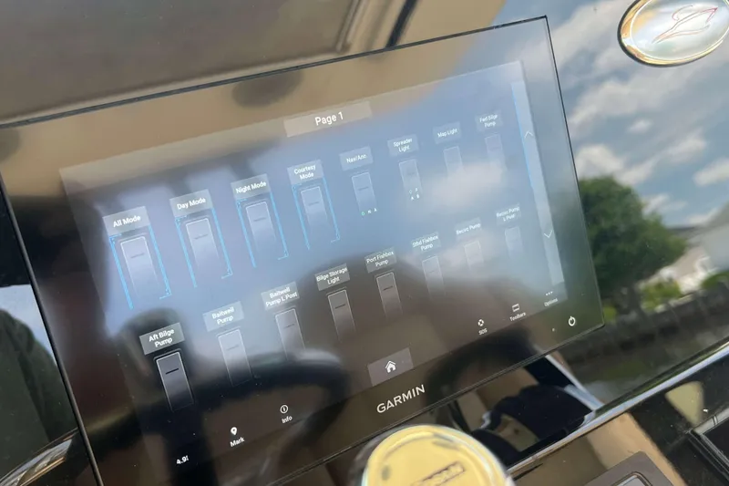 Slide: The Image of Garmin touchscreen display on 2021 Scout 305 LXF boat dashboard. - 29