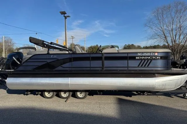 The Image of 2022 Bennington 23LFB pontoon boat parked on a sunny day. - 1