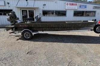 The Image of 2026 Gator Tail 2060 EXTREME C.C. boat on trailer outside dealership. - 1