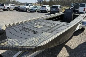 Slide: The Image of 2026 Gator Tail 2060 EXTREME C.C. boat in parking lot, showcasing sleek design. - 4