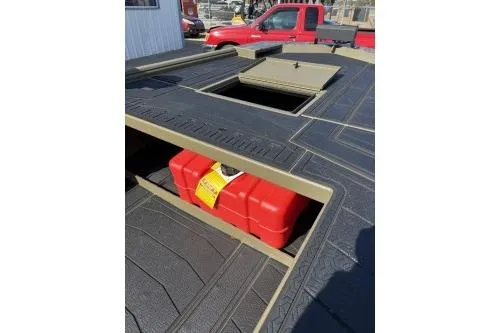 Slide: The Image of 2026 Gator Tail 2060 EXTREME C.C. boat deck with storage compartment and red fuel tank. - 5