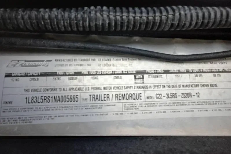 Slide: The Image of Label on 2022 Ranger Z520R trailer, displaying vehicle specifications and compliance details. - 12