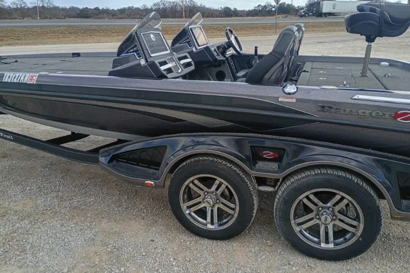 Slide: The Image of 2022 Ranger Z520R boat on trailer, featuring sleek design and dual consoles. - 3