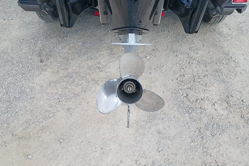 Slide: The Image of 2022 Ranger Z520R boat propeller on gravel surface, rear view. - 8
