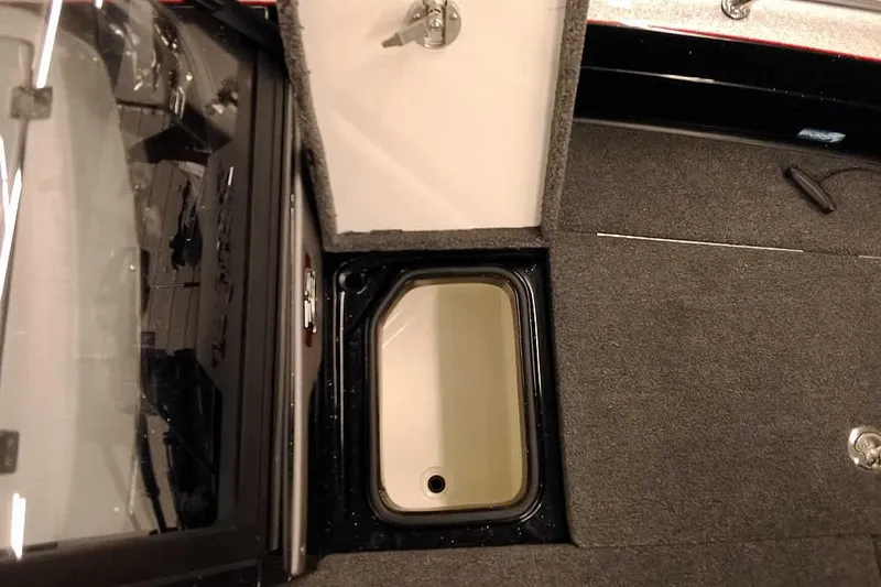 Slide: The Image of Interior view of 2026 Ranger 621FS Fisherman boat storage compartment. - 13