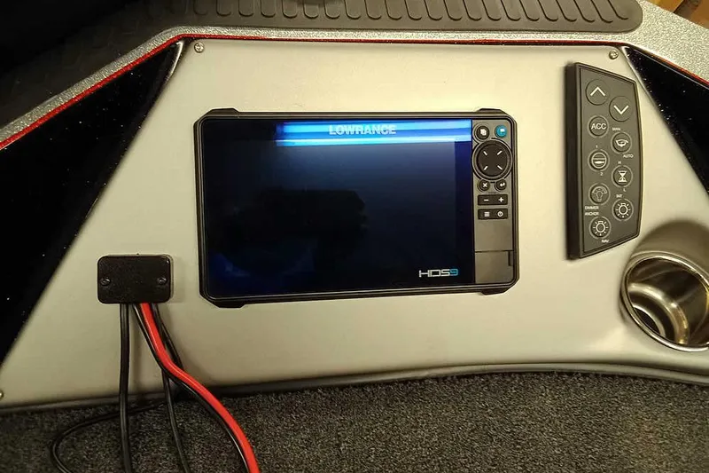 Slide: The Image of 2026 Ranger 621FS Fisherman dashboard with Lowrance HDS9 display and control panel. - 16