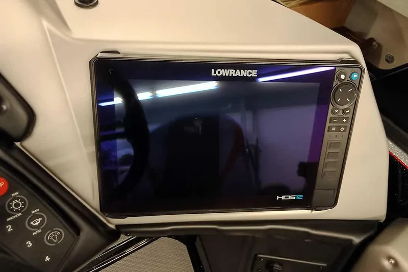 Slide: The Image of Lowrance HDS-12 display on 2026 Ranger 621FS Fisherman boat dashboard. - 23