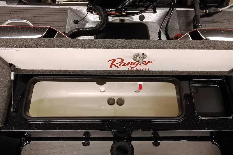 Slide: The Image of 2026 Ranger 621FS Fisherman boat interior with livewell and storage compartments. - 27