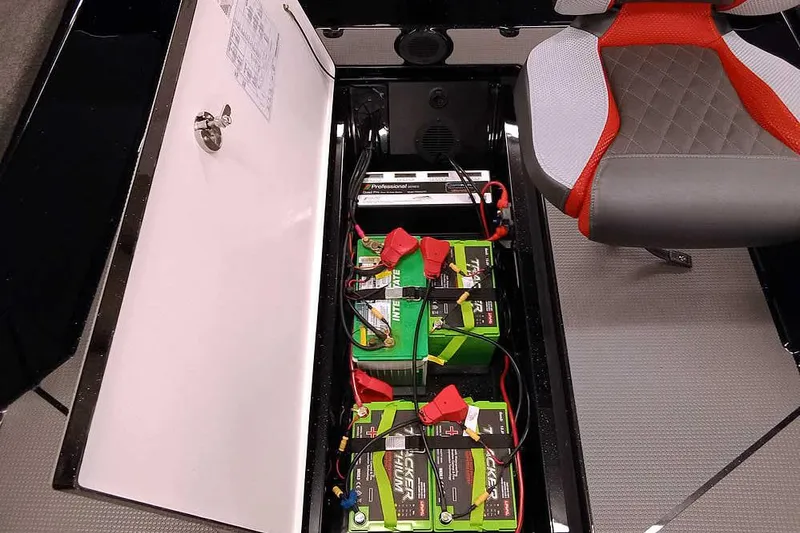 Slide: The Image of 2026 Ranger 621FS Fisherman boat interior with battery compartment and seating. - 29