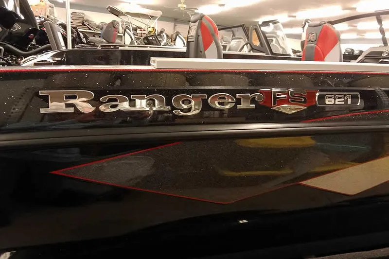 Slide: The Image of 2026 Ranger 621FS Fisherman boat, close-up of logo and interior seating. - 3