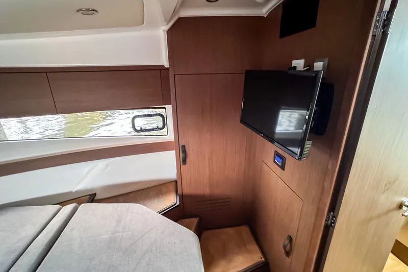 Slide: The Image of Interior cabin of 2022 Beneteau Antares 11 Fly with TV and window view. - 32