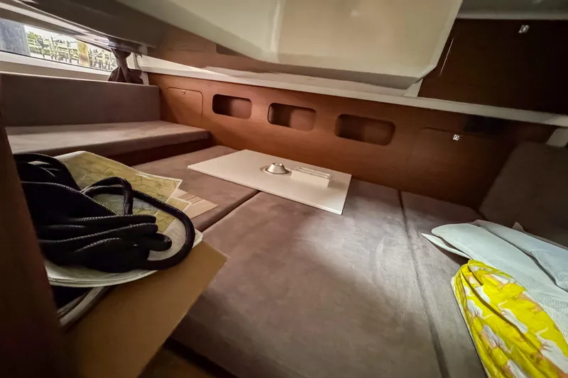 Slide: The Image of Interior cabin of 2022 Beneteau Antares 11 Fly with seating and storage. - 34