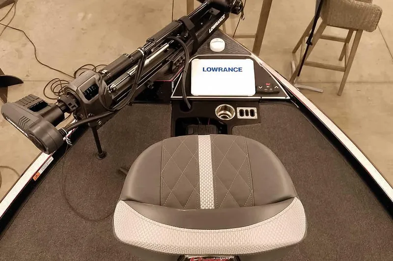 Slide: The Image of 2026 Ranger Z521R Cup-Equipped boat interior with Lowrance electronics and seating. - 10