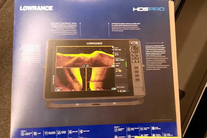 Slide: The Image of Lowrance HDS PRO display on Ranger Z521R Cup-Equipped, 2026 model, showcasing sonar technology. - 13