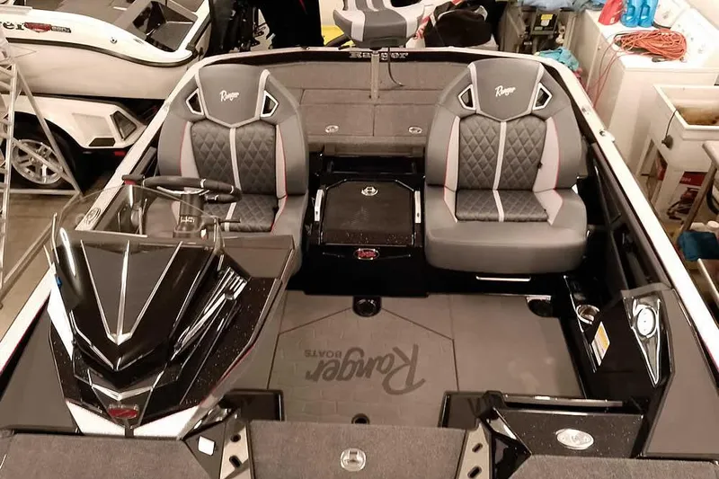 Slide: The Image of 2026 Ranger Z521R Cup-Equipped boat interior with dual seats and sleek dashboard design. - 15