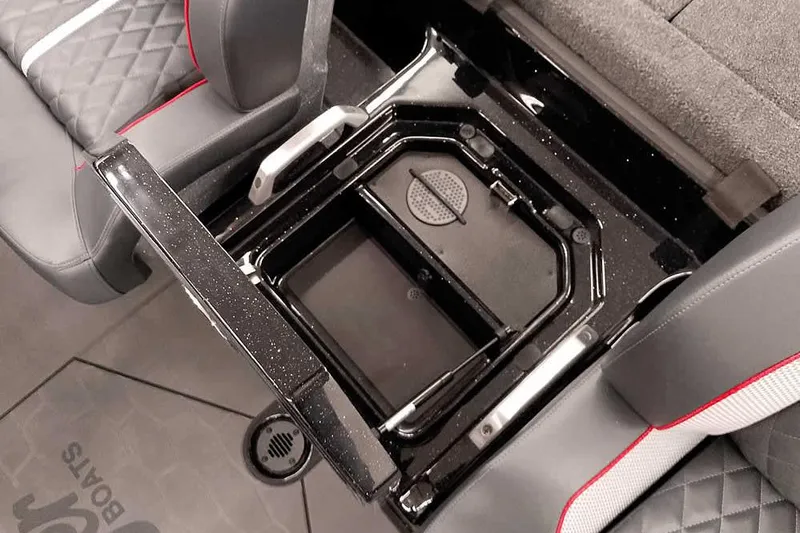 Slide: The Image of 2026 Ranger Z521R Cup-Equipped boat interior with storage compartment and seating. - 16