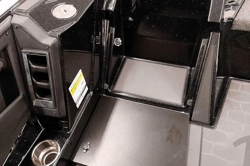 Slide: The Image of 2026 Ranger Z521R Cup-Equipped boat interior with storage compartments and cup holder. - 18