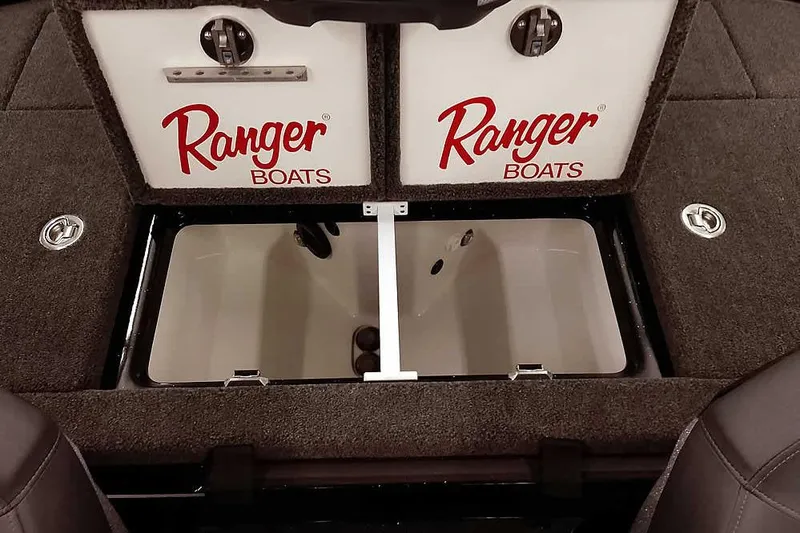 Slide: The Image of 2026 Ranger Z521R Cup-Equipped boat storage compartment with Ranger Boats branding. - 25