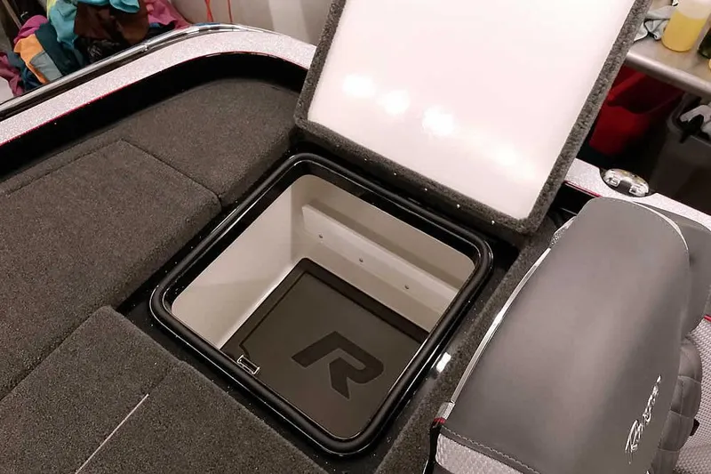Slide: The Image of Open storage compartment in 2026 Ranger Z521R Cup-Equipped boat. - 26
