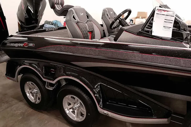 Slide: The Image of 2026 Ranger Z521R Cup-Equipped boat, sleek black design, dual axles, premium seating. - 30