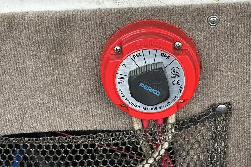 Slide: The Image of Red Perko battery switch on 2000 Ebbtide 210 Bow Rider boat. - 15