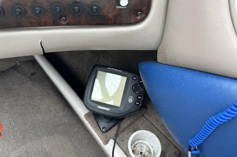 Slide: The Image of Interior of a 2000 Ebbtide 210 Bow Rider with a Humminbird fish finder. - 18