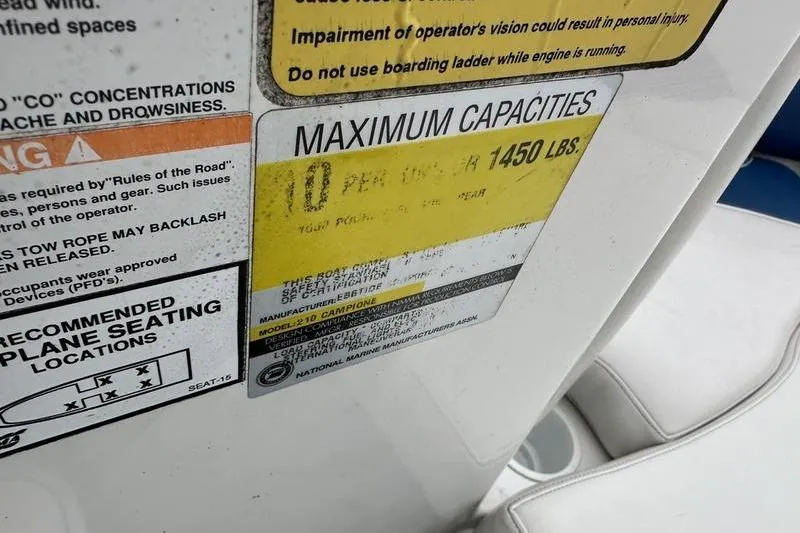 Slide: The Image of Capacity label on 2000 Ebbtide 210 Bow Rider, maximum 10 persons or 1450 lbs. - 5