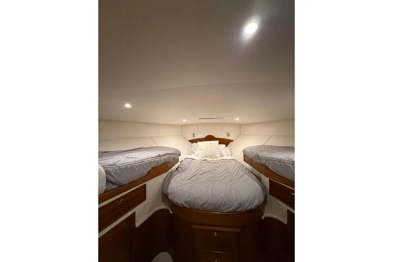Slide: The Image of Luxurious cabin interior of 2006 Blackwell 66 Convertible yacht with cozy bedding. - 15