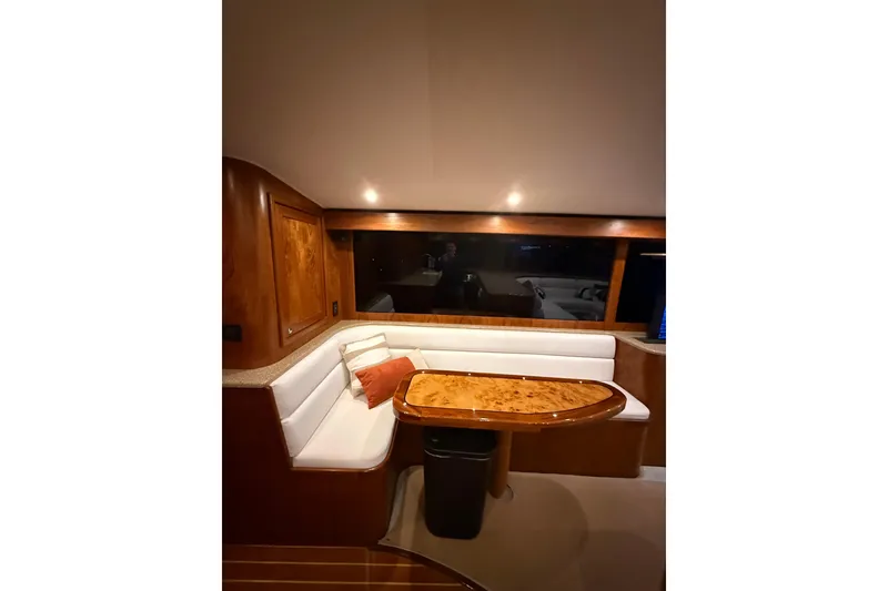 Slide: The Image of Luxurious interior of 2006 Blackwell 66 Convertible yacht with elegant wood finishes. - 19