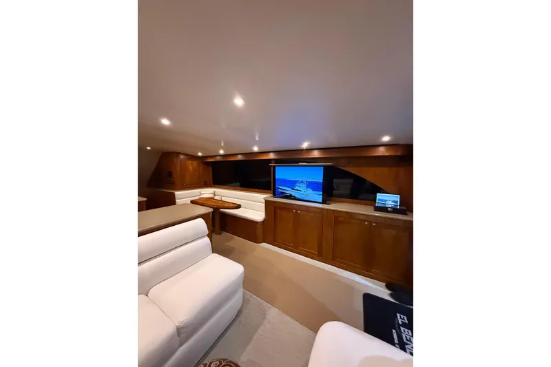 Slide: The Image of Luxurious interior of 2006 Blackwell 66 Convertible yacht with plush seating and entertainment system. - 22